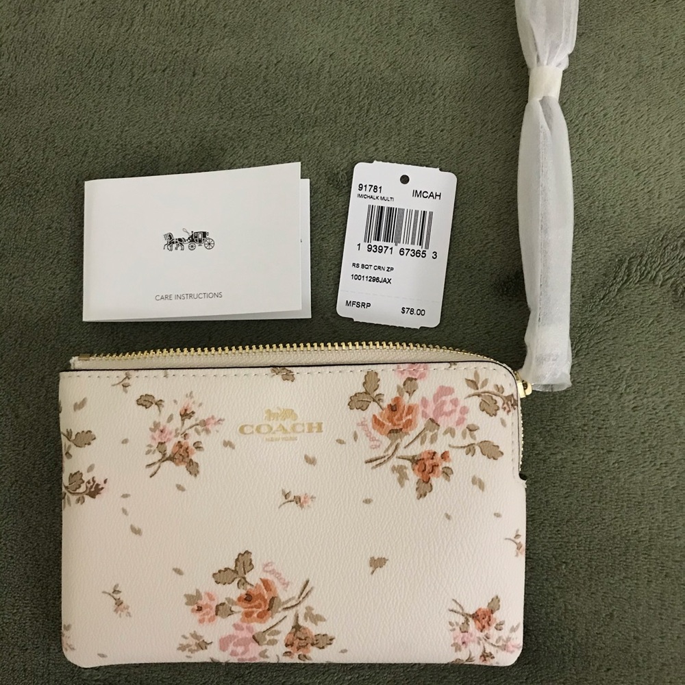 Coach corner zip wristlet with rose bouquet print